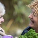 measuring well being_carer laughing with a patient