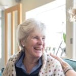 stroke recovery_patient laughing with carer