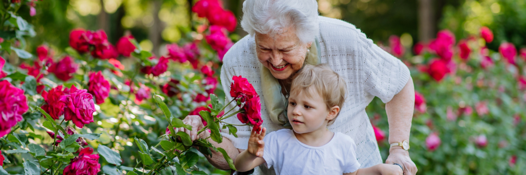 Client and granddaughter taking a walk in the garden