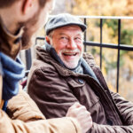 Man smiling with family